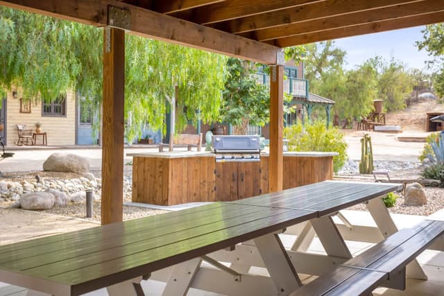 Main Home Exterior Patio with BBQ Grill